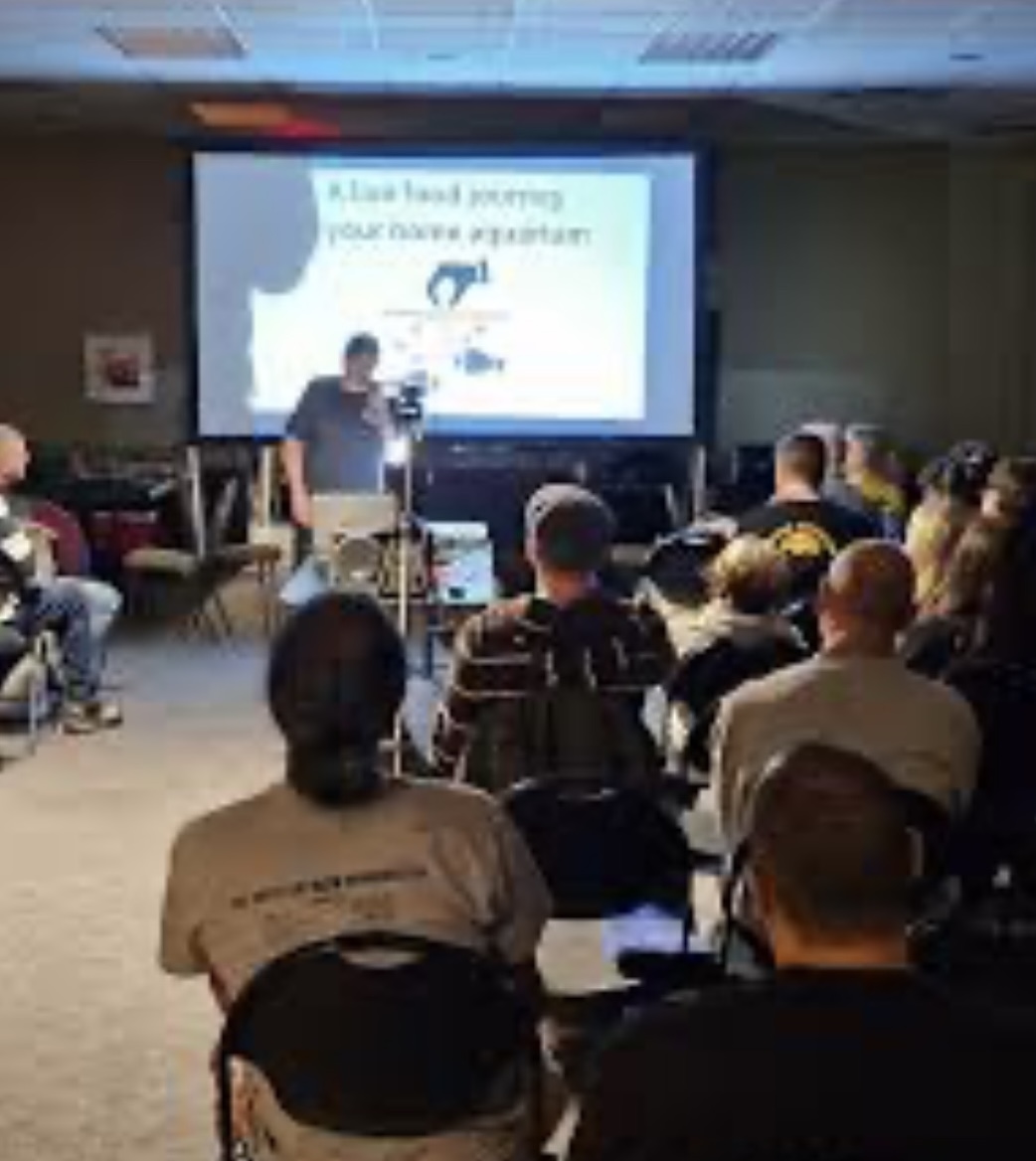 Audience attending a blackworm presentation